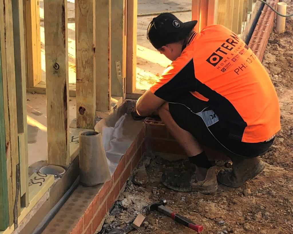 Termimesh being installed to the perimeter of a new home during construction